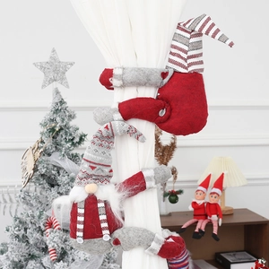 Pair of Christmas gnome curtain tiebacks in red and grey stripes for festive home decor