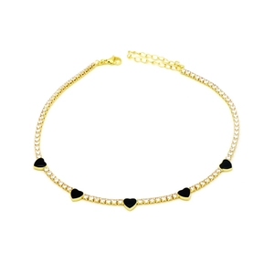 Detail of gold tennis chain featuring small zircons and five black enamel heart charms