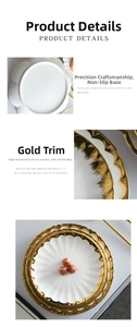 Detailed view of white ceramic plate with elegant gold rim and petal edge design