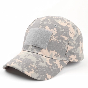 Detail of digital camouflage tactical cap featuring ripstop fabric and velcro patch