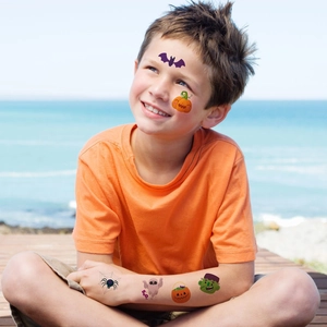 Waterproof Halloween face tattoos for kids featuring pumpkin, bat and ghost designs