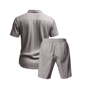 Rear view detail of dark gray linen set featuring white vertical stripes and fabric texture