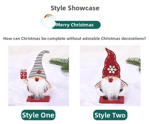 Close-up of Nordic wooden Christmas gnomes with striped hats and white fluffy beards