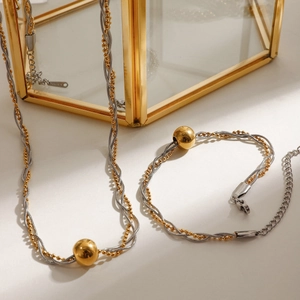 Two-tone stainless steel jewelry set with rope chain, gold beads and lobster clasps