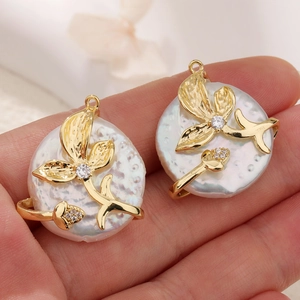 Baroque freshwater pearl flower pendant with gold plated finish and zircon accents