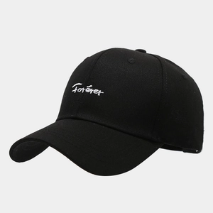 Detail view of the Forever letter embroidery on black cotton twill baseball cap