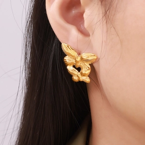 Exaggerated golden butterfly stud earrings in 18k gold plated titanium steel for women