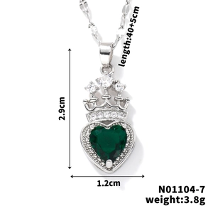 Macro shot of silver crown-heart pendant with green zircon and size measurements