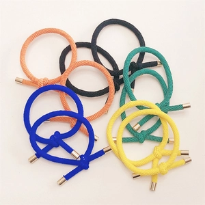 Elastic braided hair ties with metal buckles and knot design in vibrant multiple colors