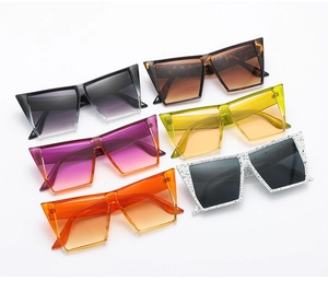 Detailed display of oversized geometric sunglasses in six stylish colors and gradients