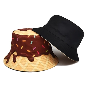 Reversible bucket hat with chocolate donut print and yellow waffle pattern design