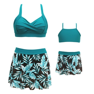 Maillots de bain assortis mère-fille vert paon avec imprimé tropical de feuilles