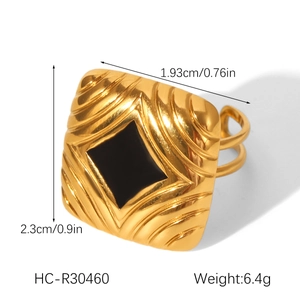 Detail view of 18K gold-plated ring with black stone inlay and size specifications