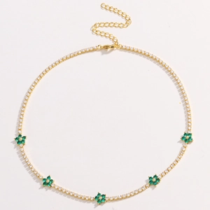 Gold tennis chain necklace with five green zircon flower pendants and adjustable lobster clasp