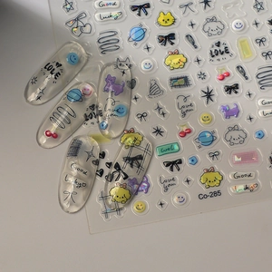 DIY nail art stickers featuring cute cat dog and bow designs on transparent false nails