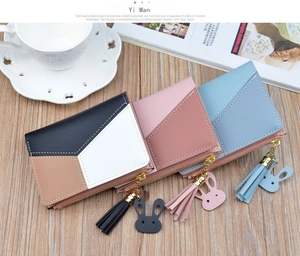 Three color-block PU leather wallets for women featuring tassel and bunny pendants