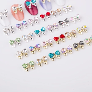3D bow-knot nail charms in multiple colors with crystal inlays on gold or silver metal base