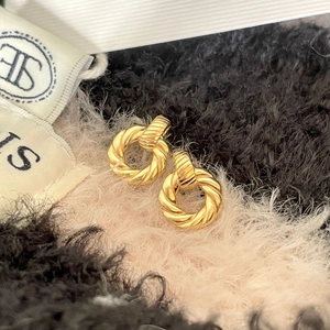 Minimalist S925 sterling silver twisted rope hoop earrings in gold with spiral texture