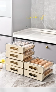 Detail view of stackable drawer-style egg storage container with clear PET lid