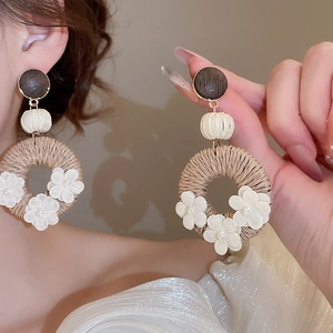 Bohemian style wood and rattan flower earrings with white fabric petals and pearls