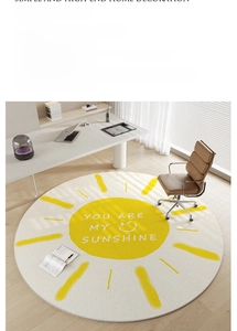 Detail of round beige rug with yellow sun pattern and soft Belgian loop velvet texture