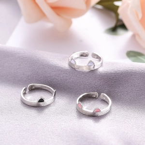 Three S925 sterling silver adjustable cat ear rings with white black and pink accents