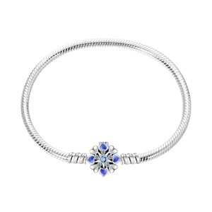 Silver snake chain bracelet with blue enamel heart charm and tree of life crystals