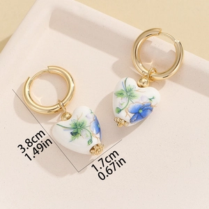 Blue flower heart ceramic pendant earrings with gold hoops showing 3.8cm length
