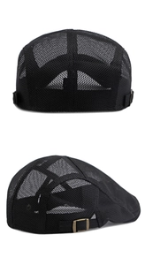 Detail of black mesh beret with breathable honeycomb fabric and bronze adjustable buckle
