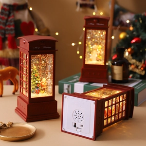 Detail of red Santa phone booth lantern with LED light and swirling glitter effect