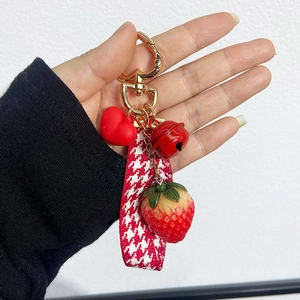 Cute strawberry keychain with red heart charm bell and houndstooth ribbon for bags