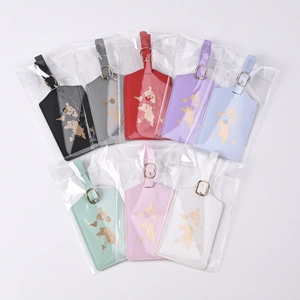Collection of PU leather travel luggage tags in eight colors with gold world map prints