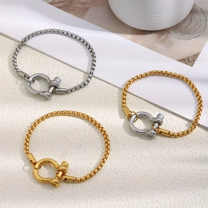 Bracelets manille en acier inoxydable plaqué or 18K aux finitions argent et doré