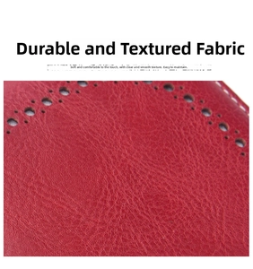 Detail of red lychee grain leather wallet featuring decorative punch-hole and fine stitching