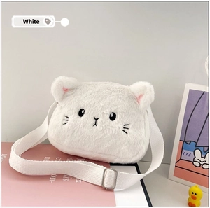 Detail view of a white plush cat-shaped crossbody bag with soft faux fur and embroidery