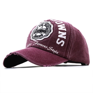 Vintage burgundy distressed baseball cap with star badge and embroidered lettering
