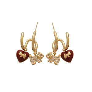 Gold plated dog and red heart stud earrings with zircon crystals in a luxury style