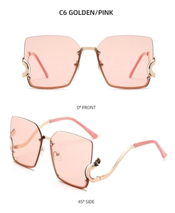 Detail of pink rimless sunglasses with wavy golden metal temples and C6 model code