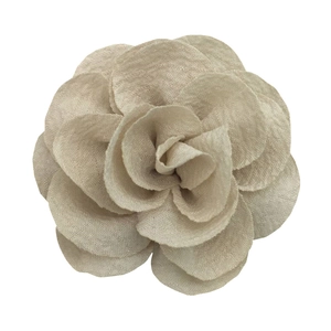 Detailed top view of a 7cm handmade bubble crepe fabric flower accessory in elegant beige