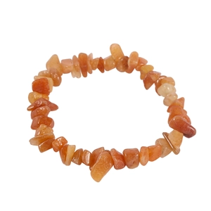 Close-up of handmade natural orange agate stone chips woven into an elastic bracelet