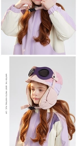 Close-up of kids winter trapper hat with goggles and warm fleece lining details