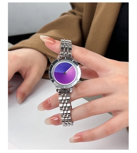 Detail of minimalist women's watch featuring a gradient purple dial and steel strap