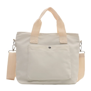 Bolso tote de lona blanco roto de gran capacidad con bolsillo frontal y correa ajustable