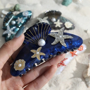Blue ocean style hair claw clip with resin starfish and pearl shell details