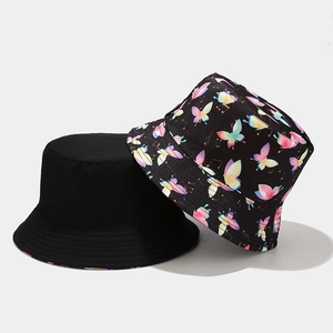 Reversible cotton bucket hats set with colorful butterfly pattern and solid black design
