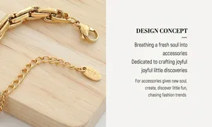 Detail of 18K gold-plated lobster clasp and extension chain with K18 engraved tag