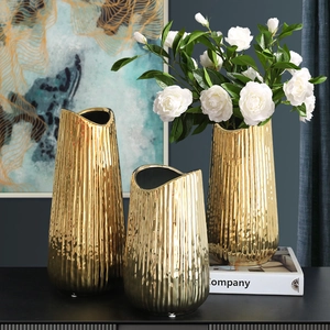 Set of 3 gold textured ceramic vases with white flowers for modern home decor