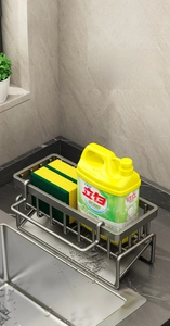 Detail of kitchen sink organizer featuring a sloped drain tray for efficient water flow