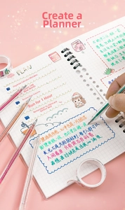 Colorful glitter gel pens set writing smoothly on planner with shiny metallic ink effect