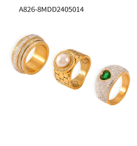 Detailed set of three gold-plated titanium rings with crystal pavé and freshwater pearl
